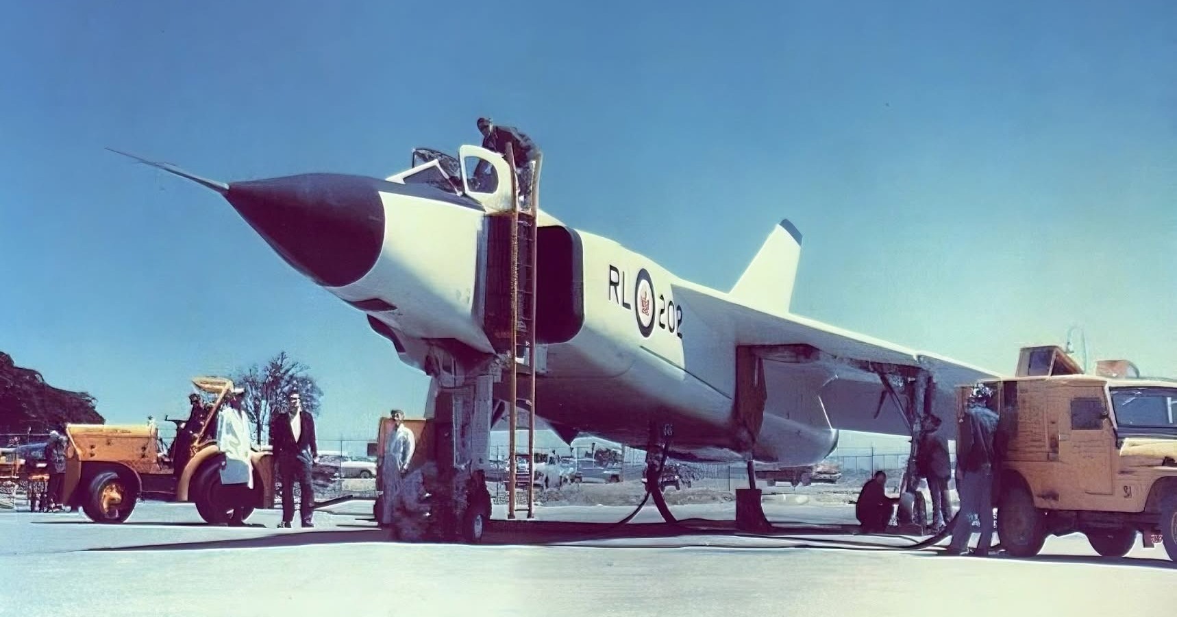 May be an image of 5 people, aircraft and text